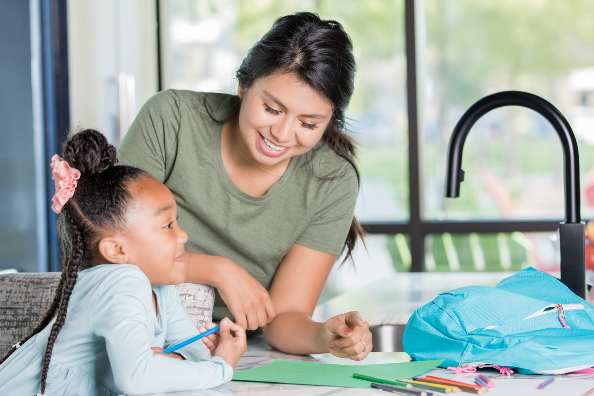 Nanny colouring with child